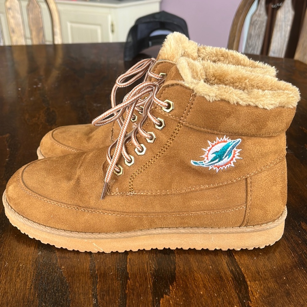 Miami Dolphins lace up boots